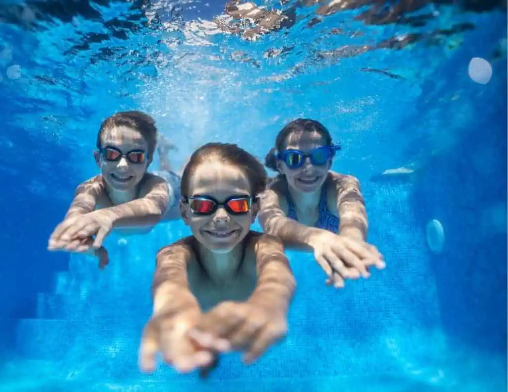 kids in the pool swimming