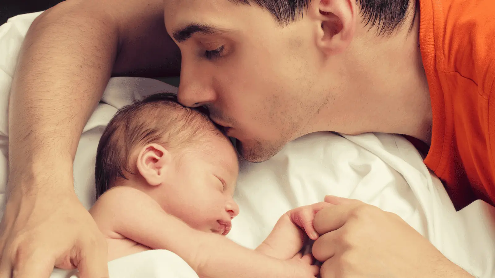 dad with a baby newborn