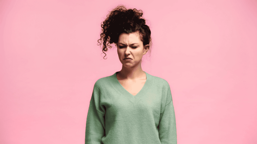 woman disgusted mad messy bun