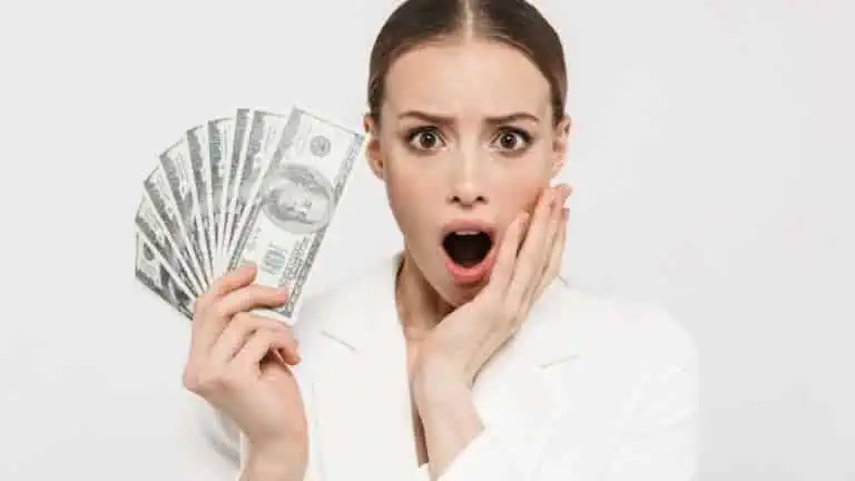shocked woman money