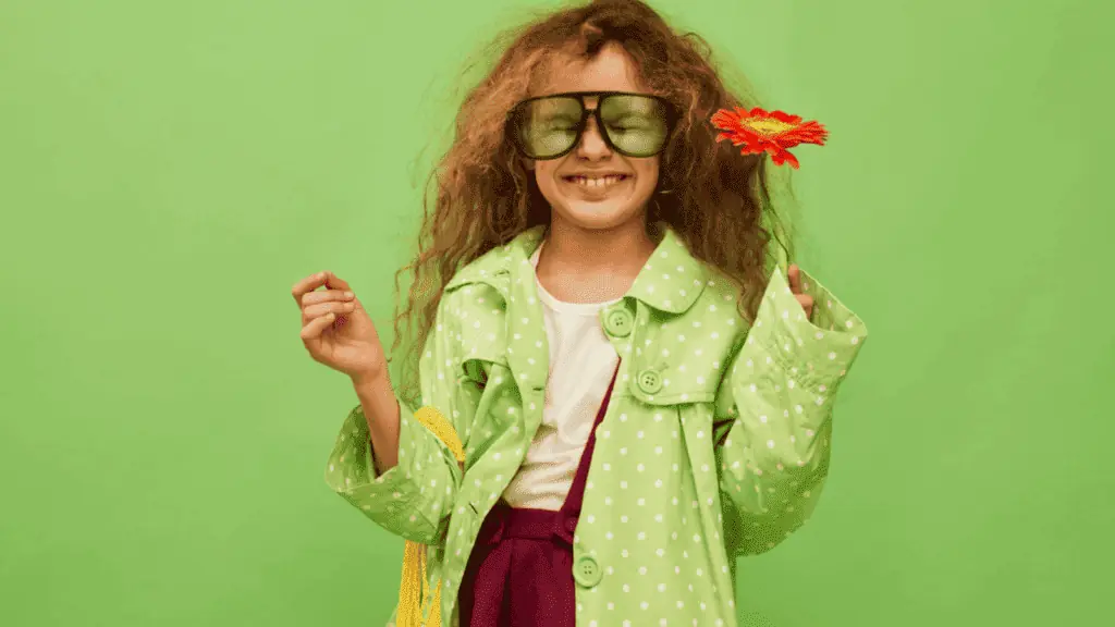 strange weird kid girlhappy smiling glasses flower green
