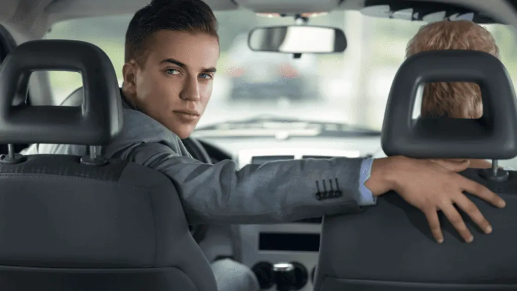 man parking hand on seat handsome