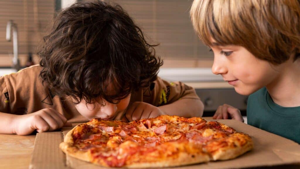 pizza is a favorite kid food that is okay in moderation