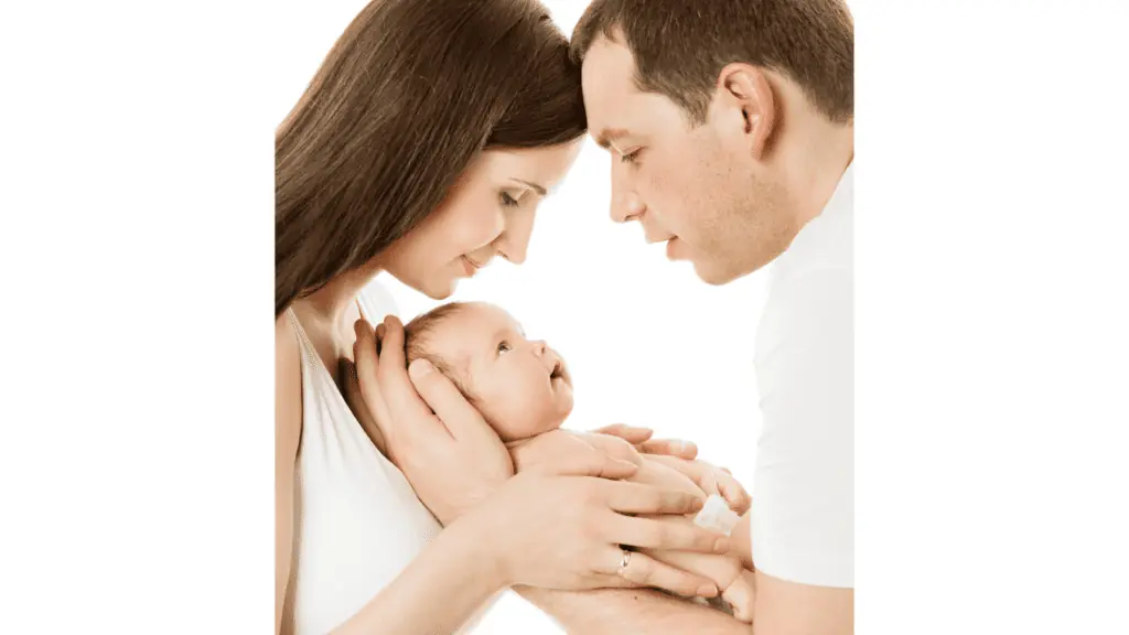 newborn baby with mom and dad