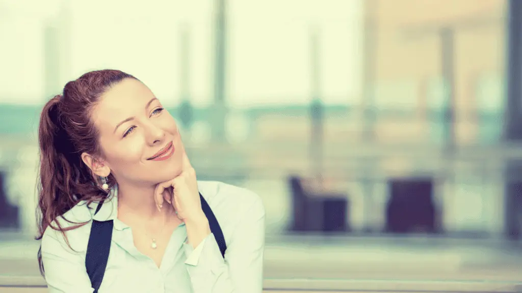 woman happy and thinking contemplating