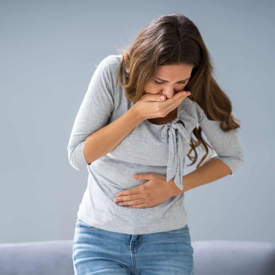 A woman with nausea pms vs pregnancy symptoms