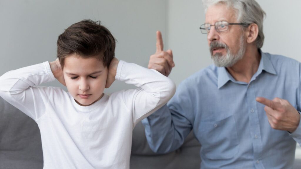 Angry old grandpa shouting at grandson close ears ignore grandfather