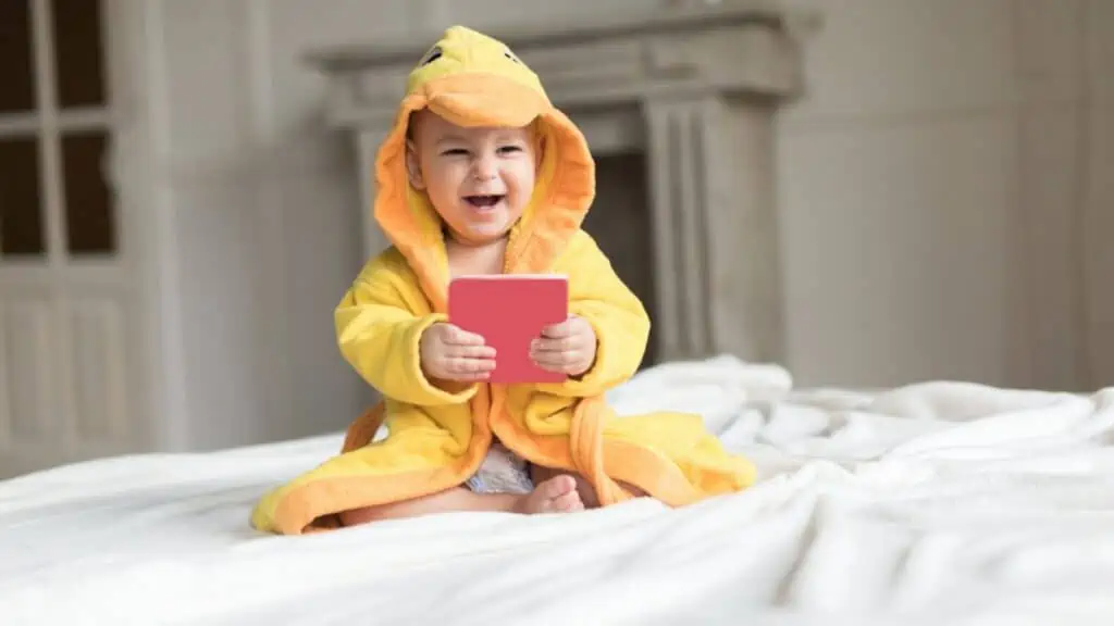 Baby boy in yellow robe