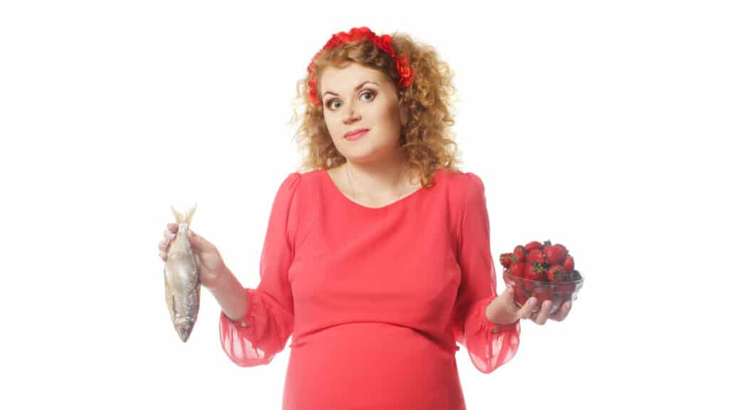 pregnant woman fish and berries