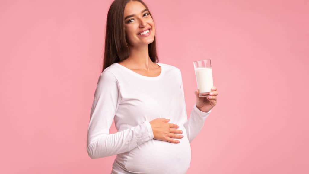 pregnant woman drinking milk