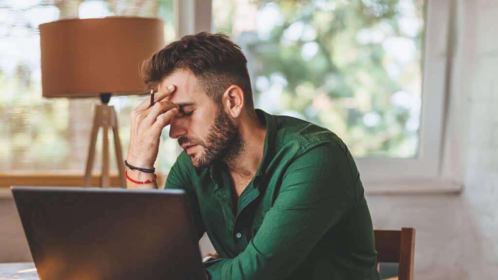 frustrated man at computer