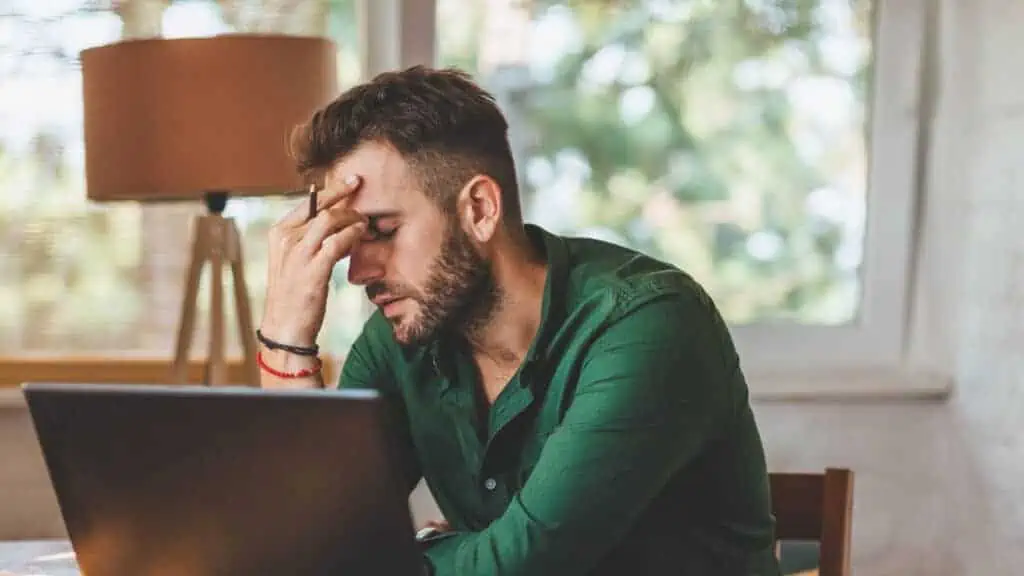 frustrated man at computer