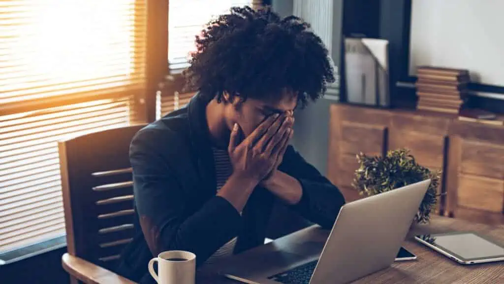 frustrated man at the computer