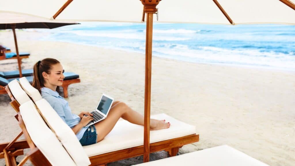 Business Woman Working Online On Beach