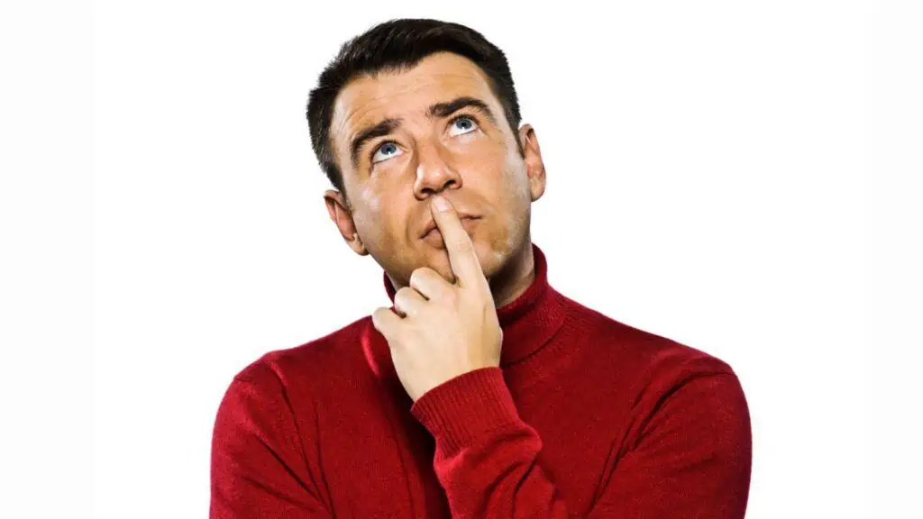 Caucasian man thinking in white background