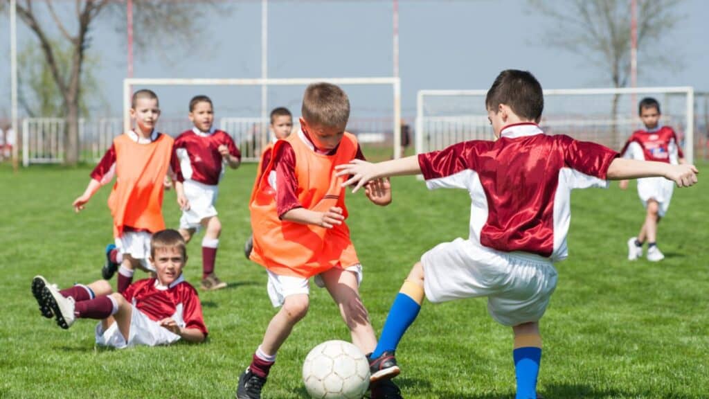 Children playing soccer