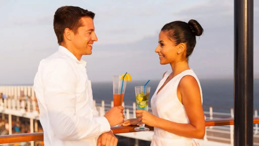 Couple on date having drinks in a cruise ship