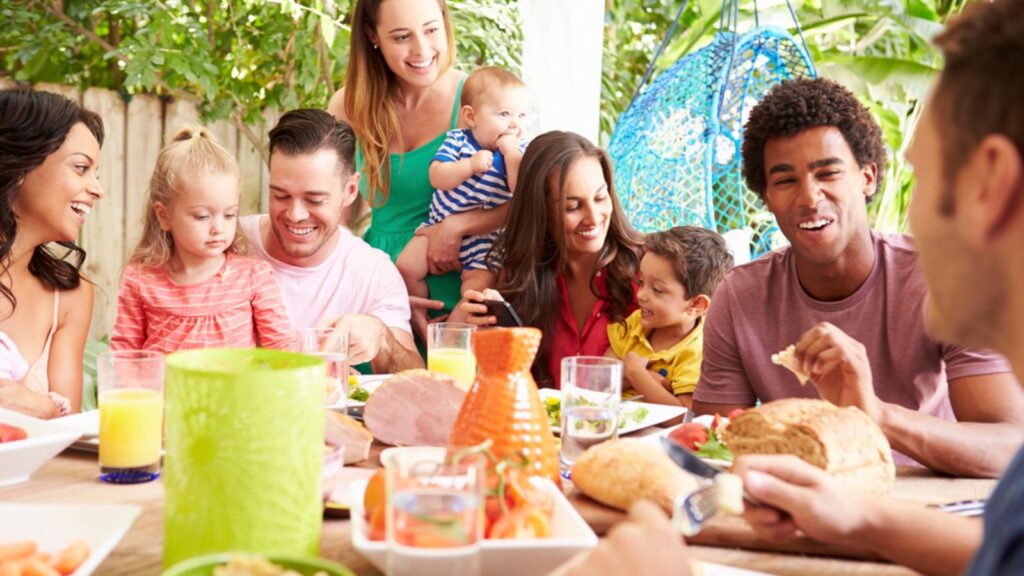 Families Enjoying Outdoor Meal