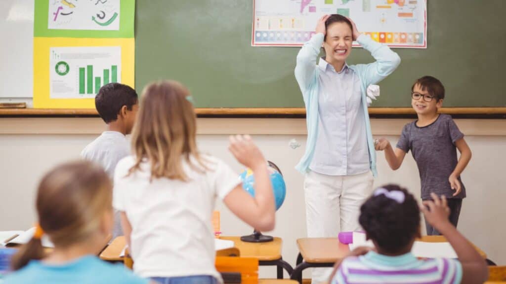 Frustrated teacher in classroom