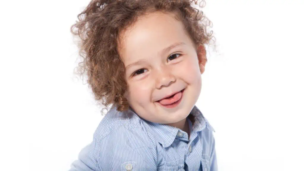 Happy Closeup Very Cute toddler boy Tongue Out