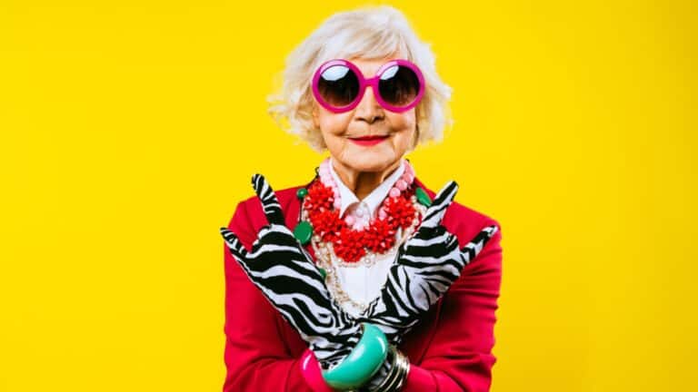 Happy and funny cool old lady with fashionable clothes