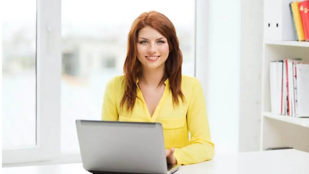 Happy woman with laptop