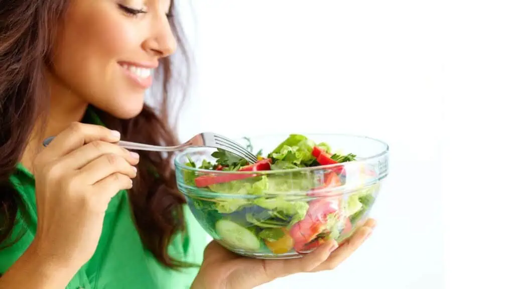 Healthy woman eating