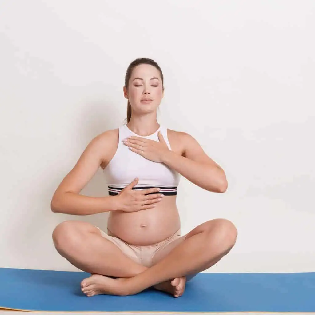 pregnant woman meditating