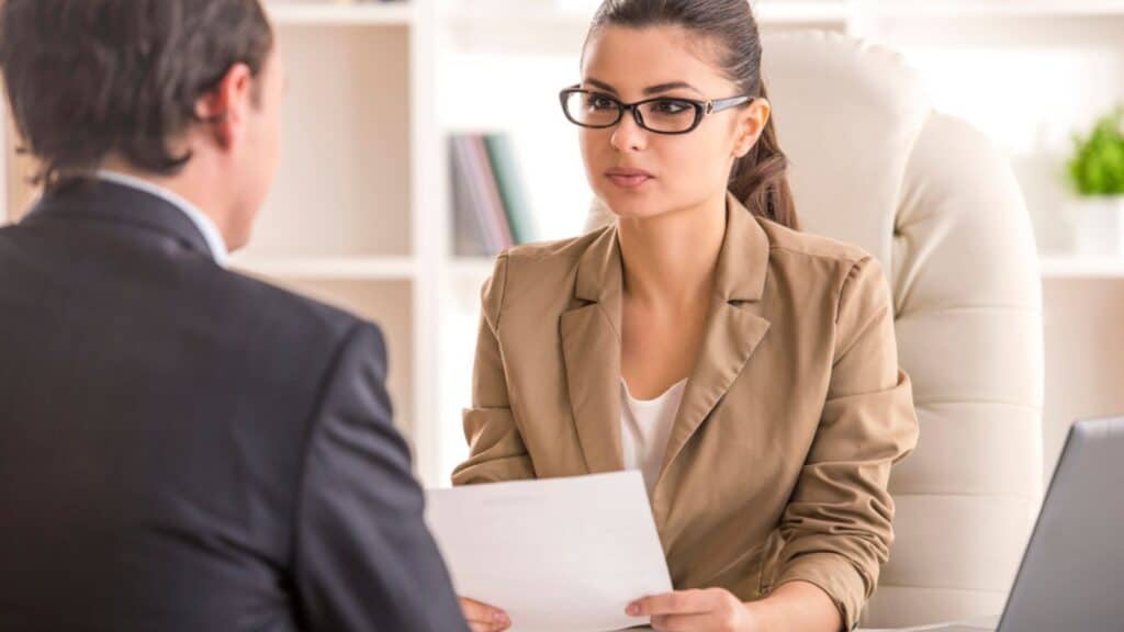 Man in the interview for a job with a woman interviewer