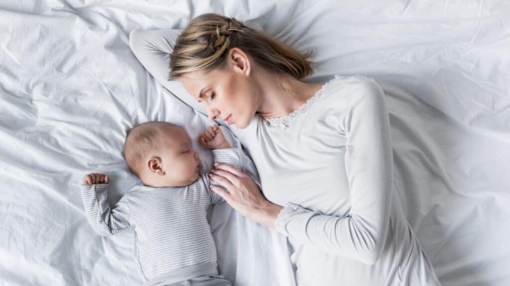 Mother and baby in white