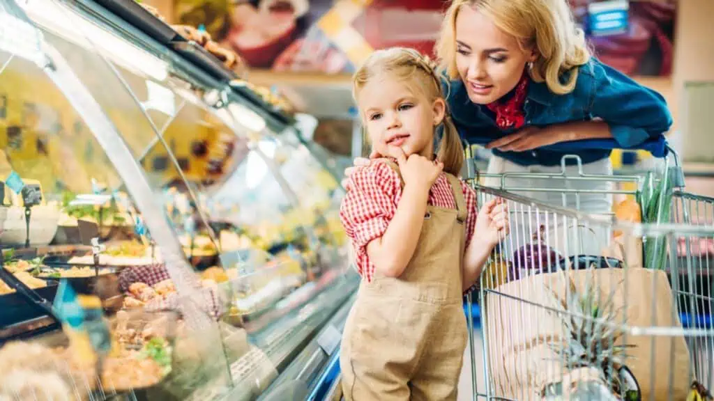 Mother and daughter in supermarket