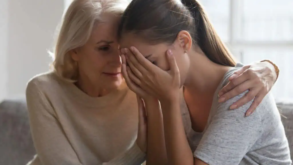 Mother expressing empathy to her adult daughter