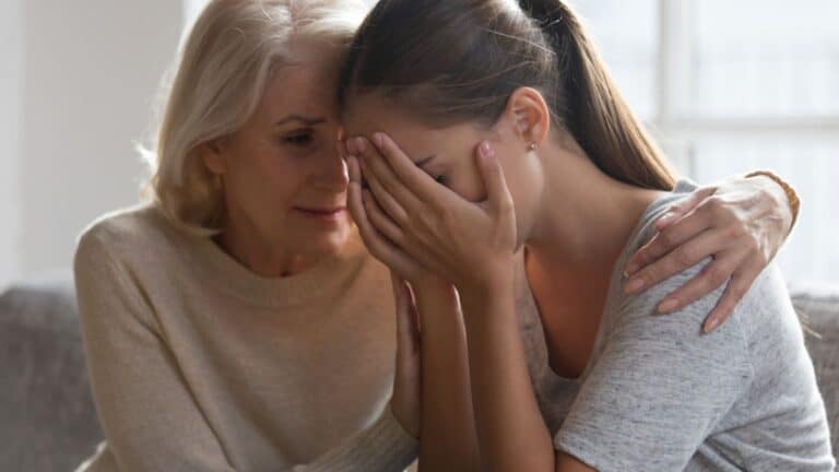 Mother expressing empathy to her adult daughter