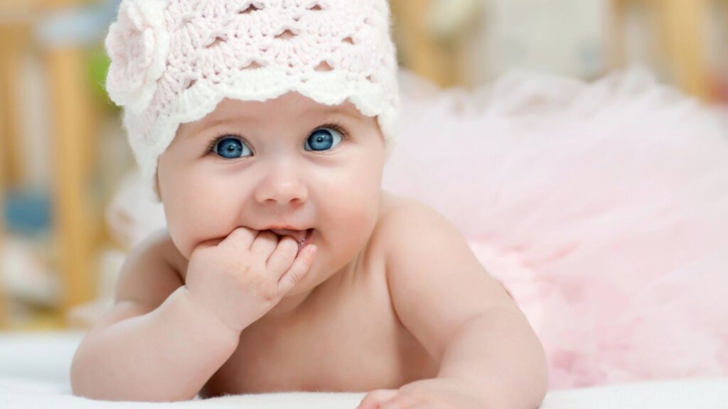 Portrait of beautiful blue-eyed baby girl
