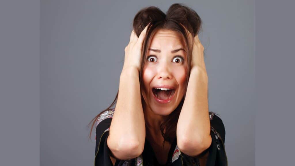 Portrait of scared woman