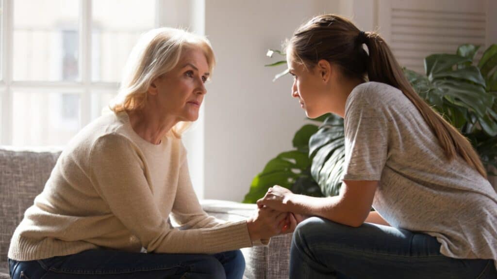 Serious mother and daughter talking