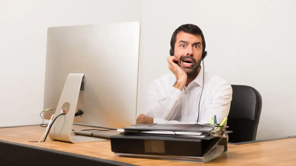 Shocked man in his computer