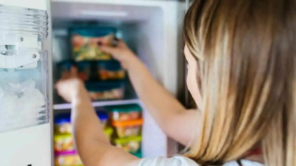 woman using a freezer meal