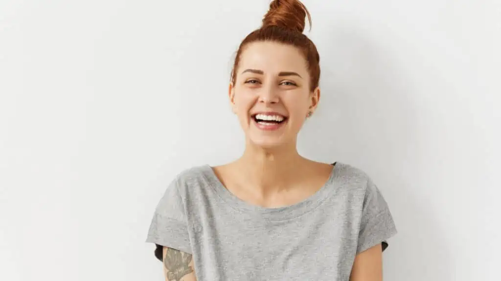 laughing woman with hair up