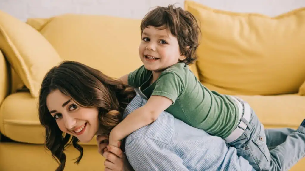 Smiling toddler and mom