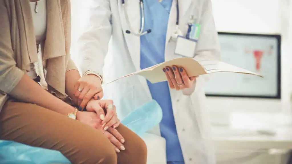 doctor with patient woman