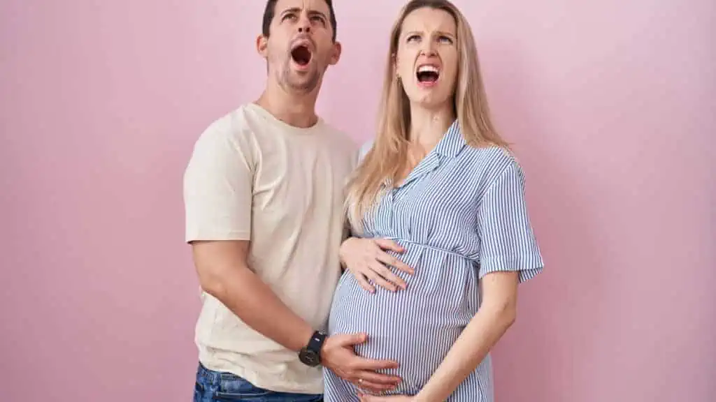 pregnant woman with man mom dad confused yelling mad why