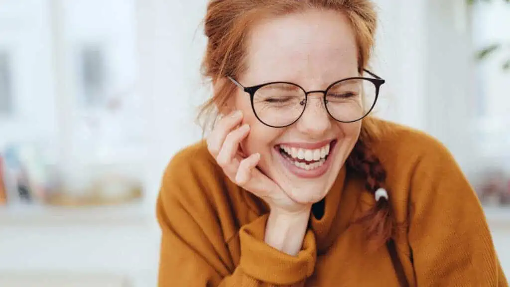 laughing happy woman in red