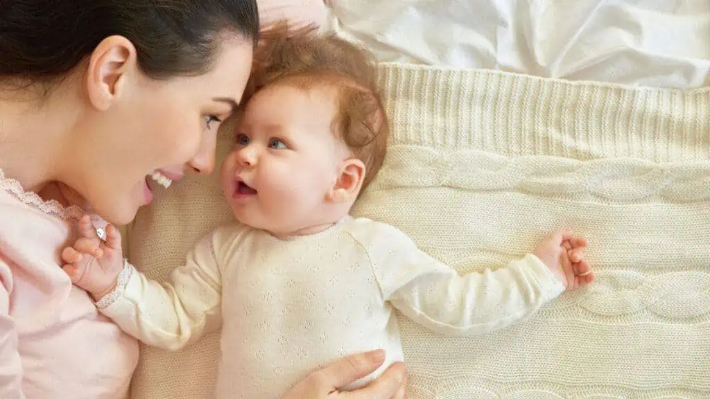 mom and baby happy smiling