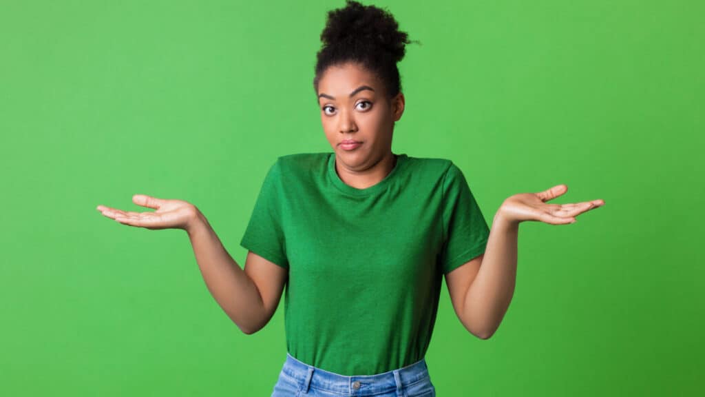 woman not sorry asking why hands up green