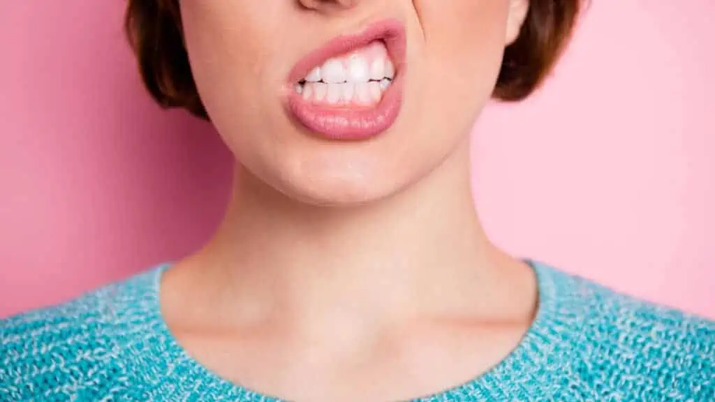 frustrated woman teeth
