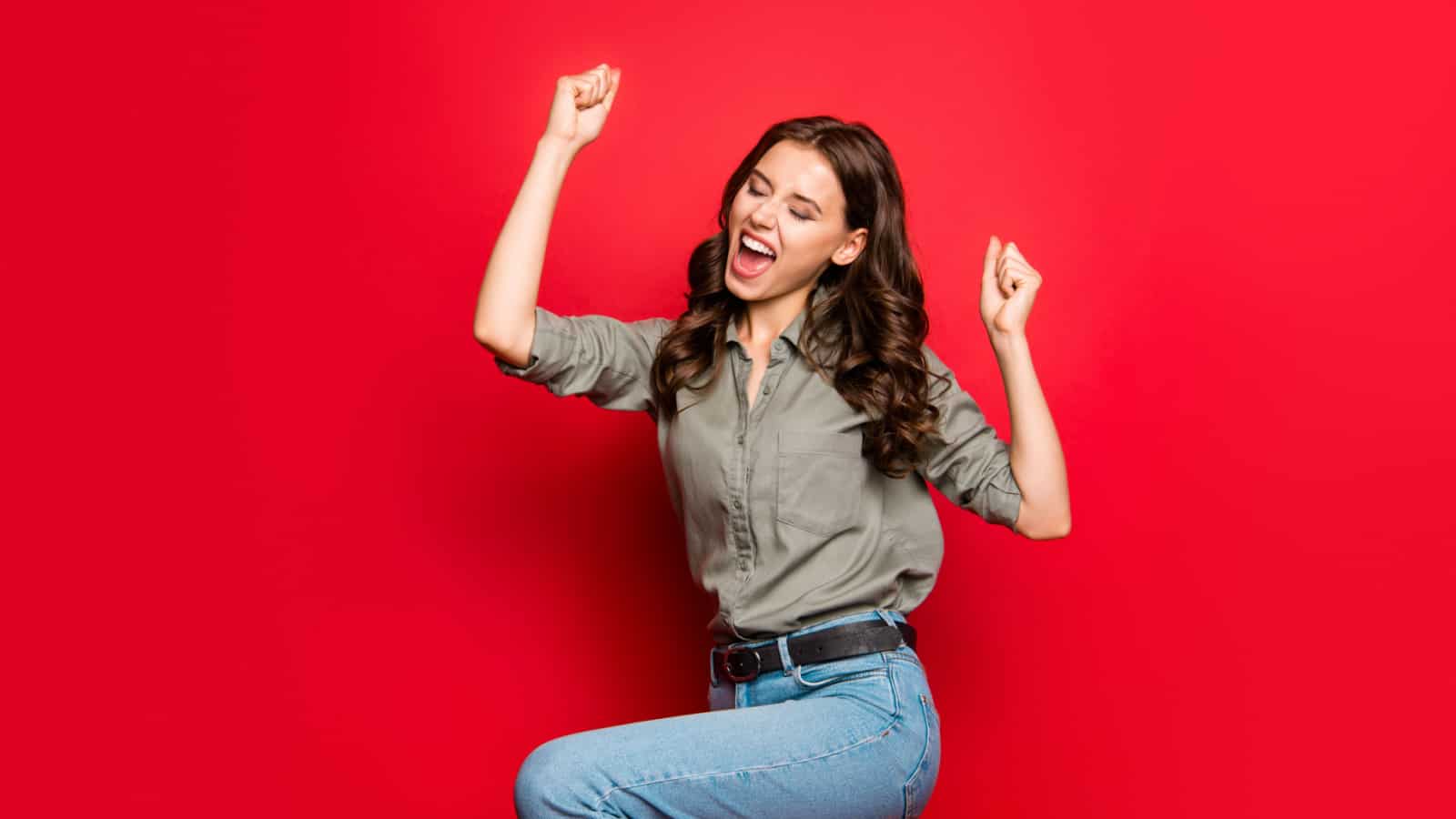 woman happy jumping red