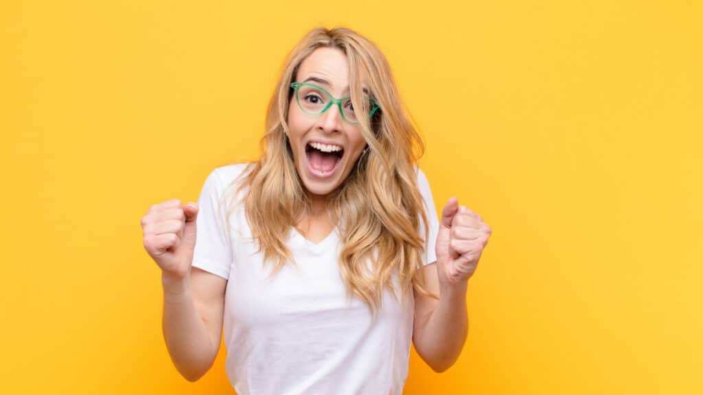 woman excited happy crazy smiling