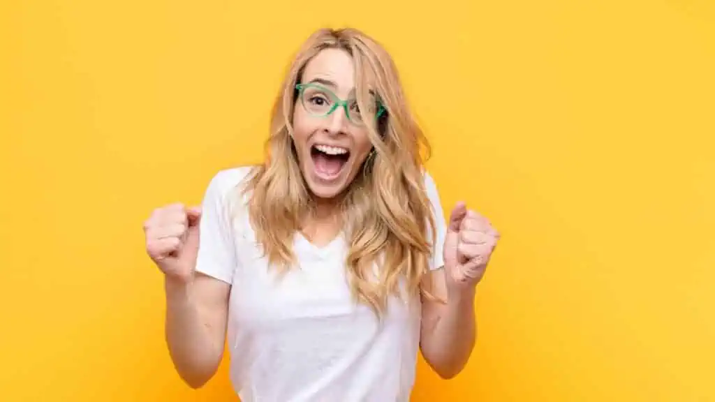 woman excited happy crazy smiling