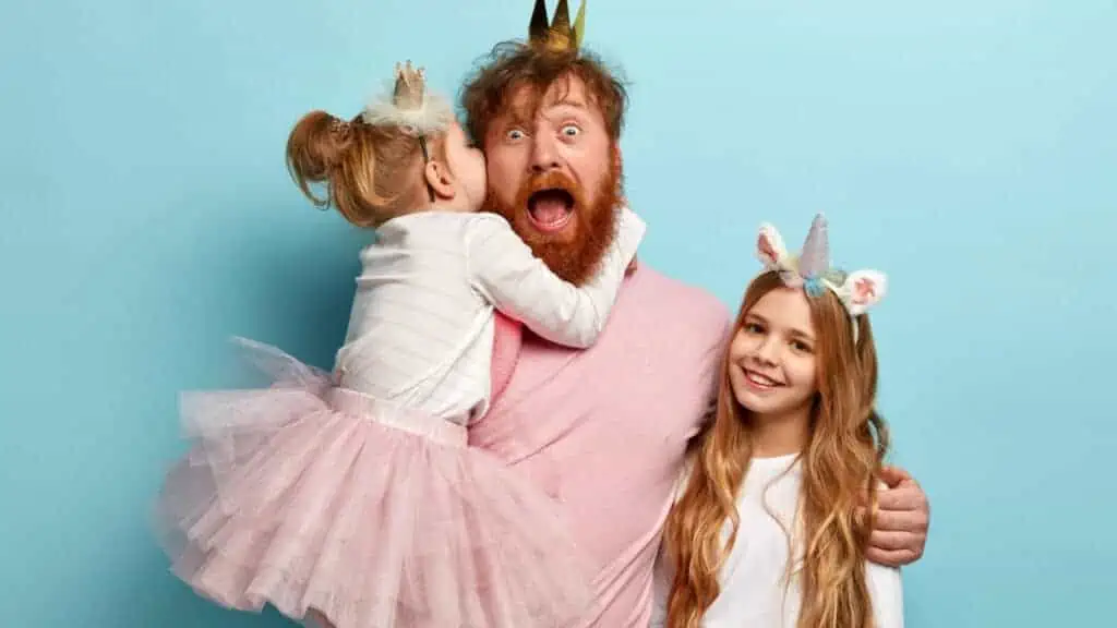 dad with his girls in pink